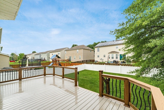 978 Vanwert Loop, Blacklick, OH 43004 - deck featuring a residential view, a fenced backyard, and a playground