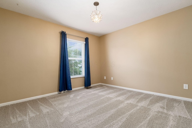 978 Vanwert Loop, Blacklick, OH 43004 - carpeted empty room featuring baseboards and a chandelier