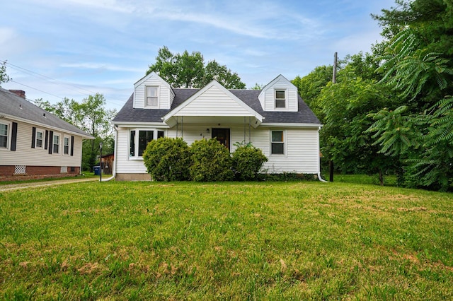 479 Maplewood Ave, Columbus, OH 43213 - cape cod-style house with a front lawn and roof with shingles