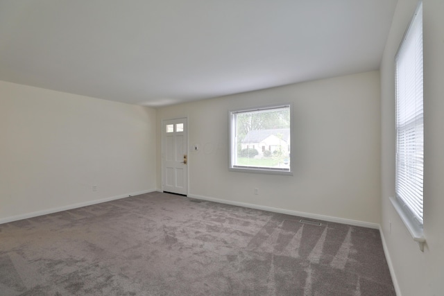815 Eddystone Ave, Columbus, OH 43224 - spare room featuring carpet and baseboards