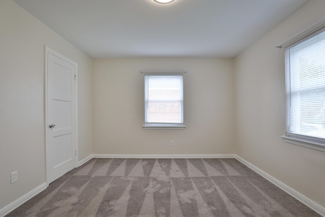 815 Eddystone Ave, Columbus, OH 43224 - carpeted empty room with healthy amount of natural light