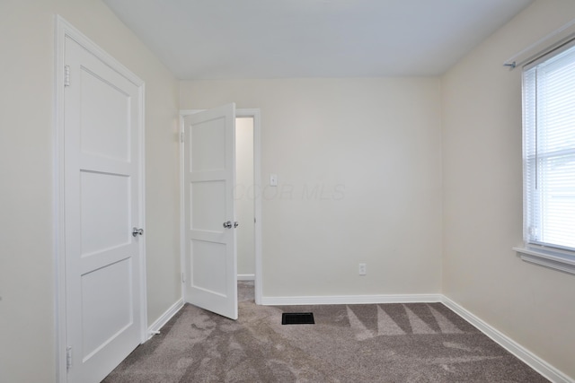 815 Eddystone Ave, Columbus, OH 43224 - carpeted spare room with plenty of natural light