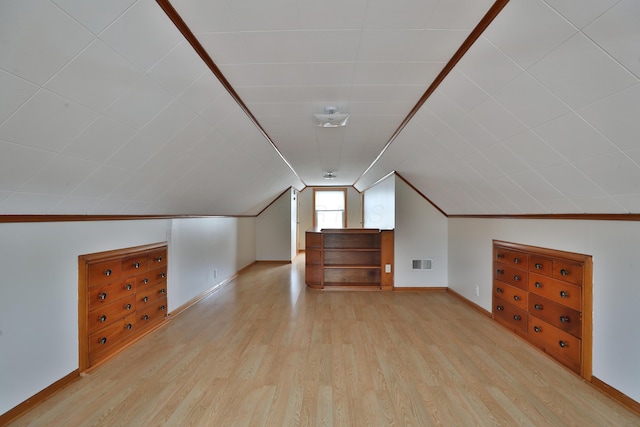 815 Eddystone Ave, Columbus, OH 43224 - additional living space with wood finished floors and vaulted ceiling