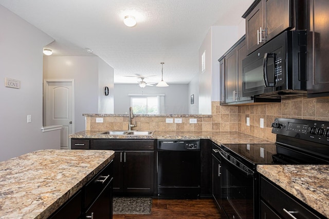 5731 Passage Creek Dr, Dublin, OH 43016 - kitchen with black appliances, dark wood-style flooring, a peninsula, decorative backsplash, and a ceiling fan