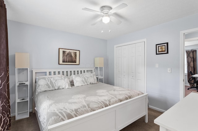 11962 Joppa Rd, Logan, OH 43138 - bedroom featuring dark carpet, a closet, and a ceiling fan