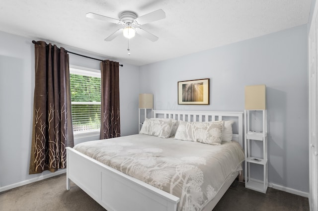 11962 Joppa Rd, Logan, OH 43138 - bedroom with carpet, ceiling fan, and a textured ceiling