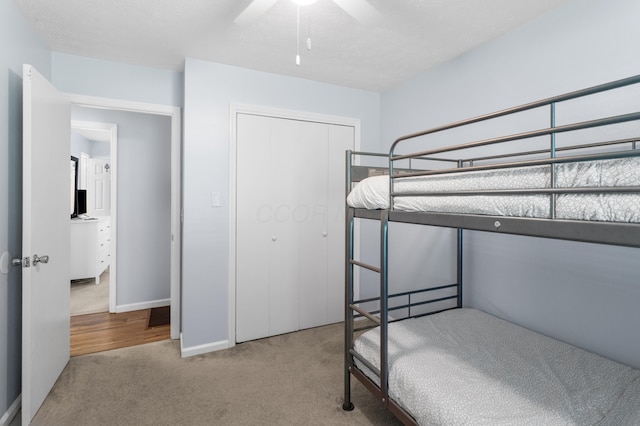 11962 Joppa Rd, Logan, OH 43138 - unfurnished bedroom featuring carpet flooring, a closet, and a ceiling fan