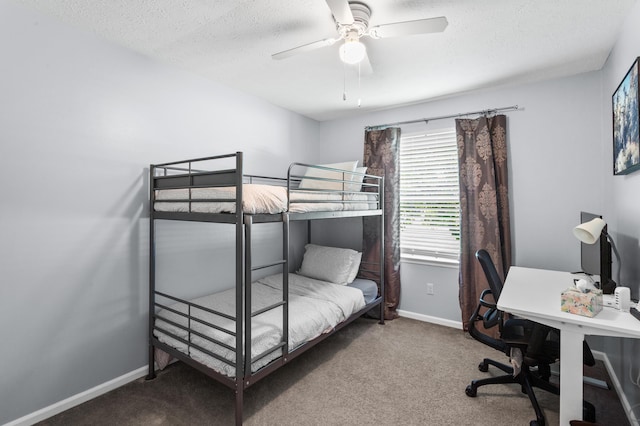 11962 Joppa Rd, Logan, OH 43138 - bedroom with carpet, a desk, a textured ceiling, and ceiling fan