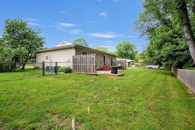 11962 Joppa Rd, Logan, OH 43138 - fenced backyard with a gate and a patio area