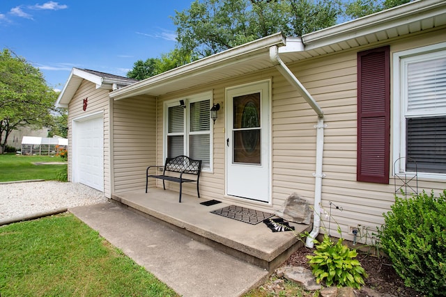 11962 Joppa Rd, Logan, OH 43138 - doorway to property with a garage, a porch, and driveway