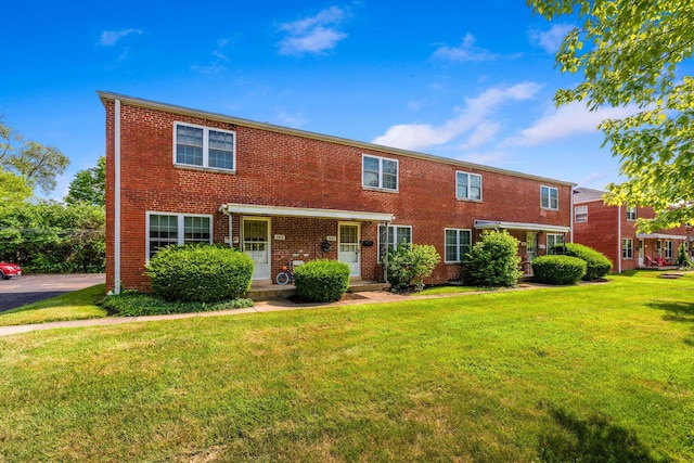 2043 Ridgeview Rd, Columbus, OH 43221 - view of front of home with brick siding and a front yard