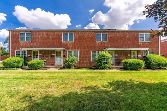 2043 Ridgeview Rd, Columbus, OH 43221 - multi unit property featuring a front yard and brick siding
