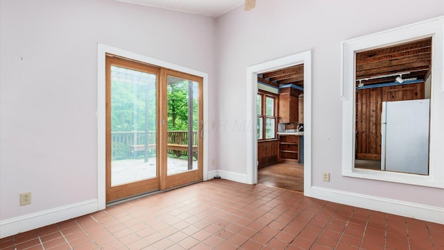 339 W Maple St, Granville, OH 43023 - spare room featuring baseboards and tile patterned floors