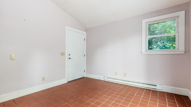 339 W Maple St, Granville, OH 43023 - unfurnished room featuring a baseboard radiator and lofted ceiling
