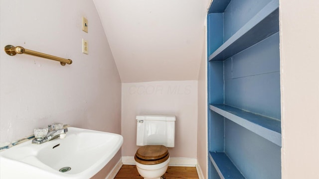 339 W Maple St, Granville, OH 43023 - bathroom with wood finished floors and lofted ceiling