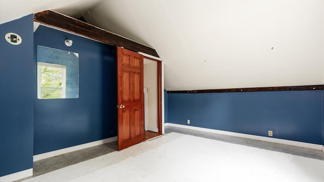 339 W Maple St, Granville, OH 43023 - unfurnished room with vaulted ceiling and baseboards