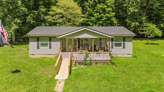 22139 Sams Creek Rd, Laurelville, OH 43135 - view of front facade with crawl space, a front lawn, a metal roof, and covered porch