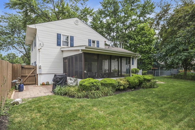 4861 Dickens Dr, Columbus, OH 43227 - back of property with a sunroom and a gate