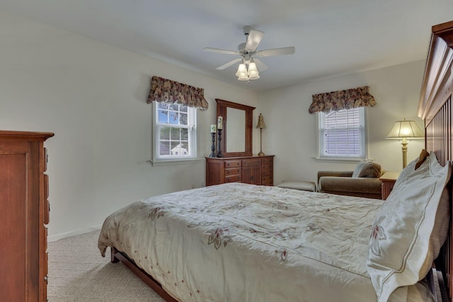 4861 Dickens Dr, Columbus, OH 43227 - carpeted bedroom with multiple windows and a ceiling fan