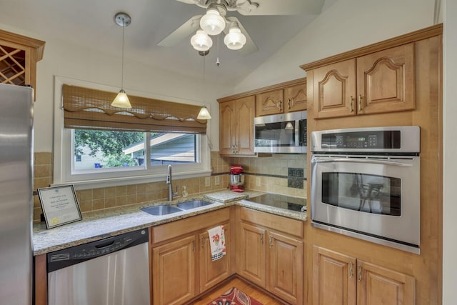 4861 Dickens Dr, Columbus, OH 43227 - kitchen featuring stainless steel appliances, backsplash, light stone counters, a ceiling fan, and decorative light fixtures