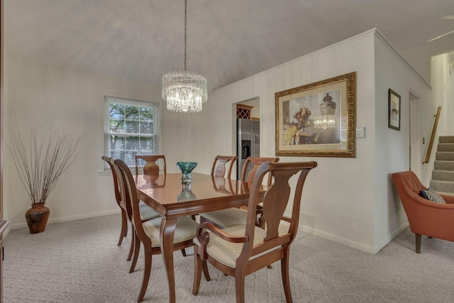 4861 Dickens Dr, Columbus, OH 43227 - carpeted dining room with a chandelier and stairway