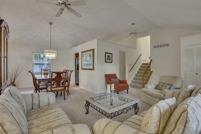 4861 Dickens Dr, Columbus, OH 43227 - living area with ceiling fan, vaulted ceiling, light colored carpet, a chandelier, and stairs