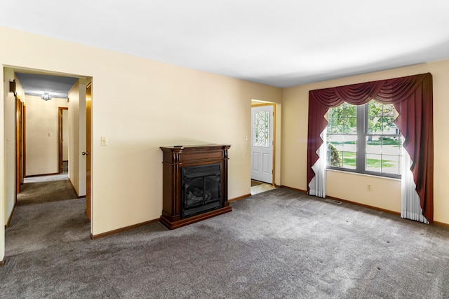 6983 Doran Dr, New Albany, OH 43054 - unfurnished living room with carpet floors and a glass covered fireplace