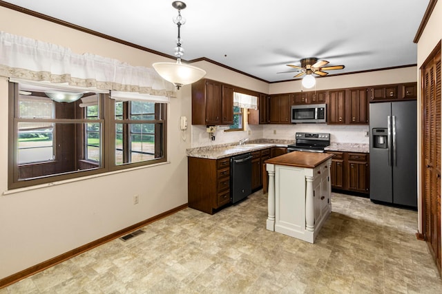 6983 Doran Dr, New Albany, OH 43054 - kitchen featuring stainless steel appliances, a ceiling fan, tasteful backsplash, dark brown cabinetry, and pendant lighting