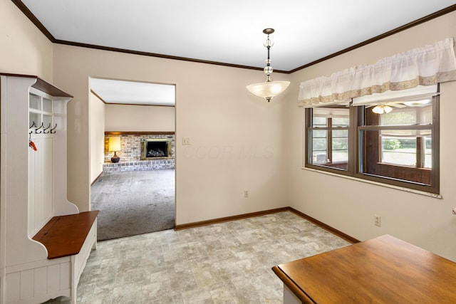 6983 Doran Dr, New Albany, OH 43054 - unfurnished dining area with ornamental molding, a fireplace, and carpet