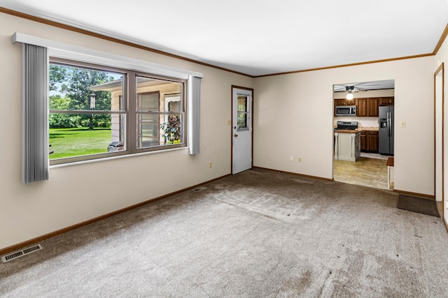 6983 Doran Dr, New Albany, OH 43054 - unfurnished living room with light colored carpet, crown molding, and a ceiling fan