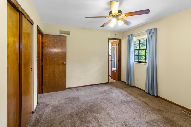 6983 Doran Dr, New Albany, OH 43054 - unfurnished bedroom with carpet flooring, ceiling fan, and a closet