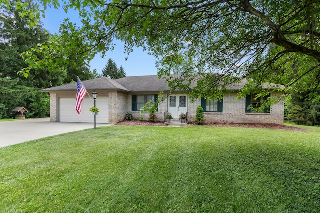 6983 Doran Dr, New Albany, OH 43054 - ranch-style home with brick siding, a garage, driveway, and a front lawn