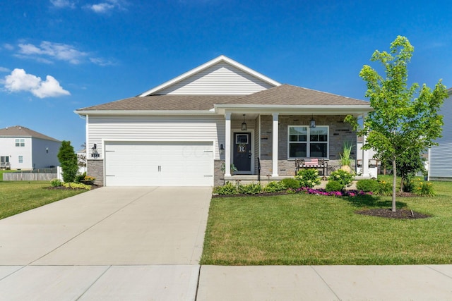 152 Natalie Ln, Granville, OH 43023 - view of front of home featuring covered porch, a front yard, concrete driveway, and an attached garage