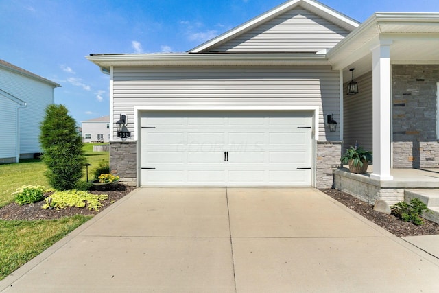 152 Natalie Ln, Granville, OH 43023 - garage featuring concrete driveway