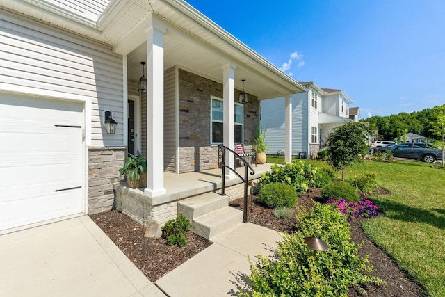 152 Natalie Ln, Granville, OH 43023 - entrance to property with a porch, a yard, and stone siding