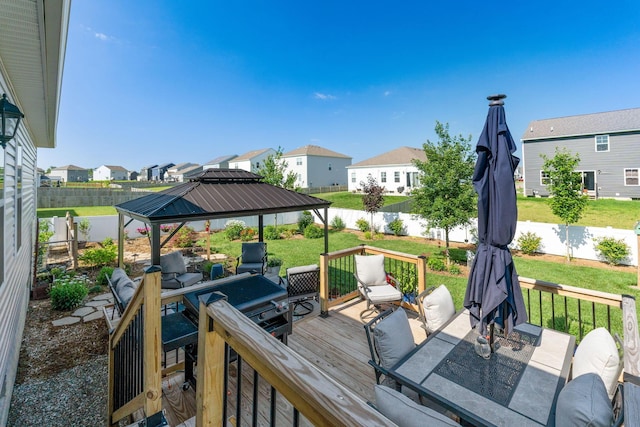 152 Natalie Ln, Granville, OH 43023 - deck featuring a gazebo, a fenced backyard, a residential view, and an outdoor living space