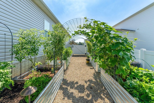 152 Natalie Ln, Granville, OH 43023 - view of yard featuring a vegetable garden and a gate
