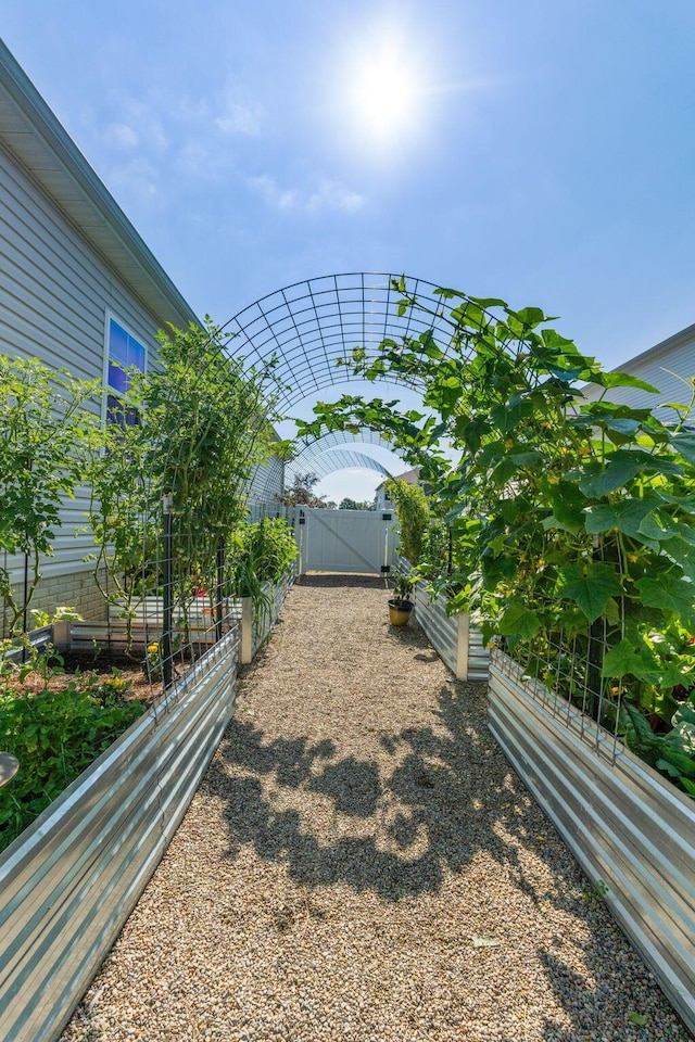 152 Natalie Ln, Granville, OH 43023 - view of yard with a garden and a gate
