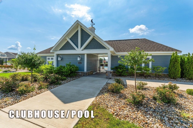 152 Natalie Ln, Granville, OH 43023 - view of front facade with a chimney and a shingled roof