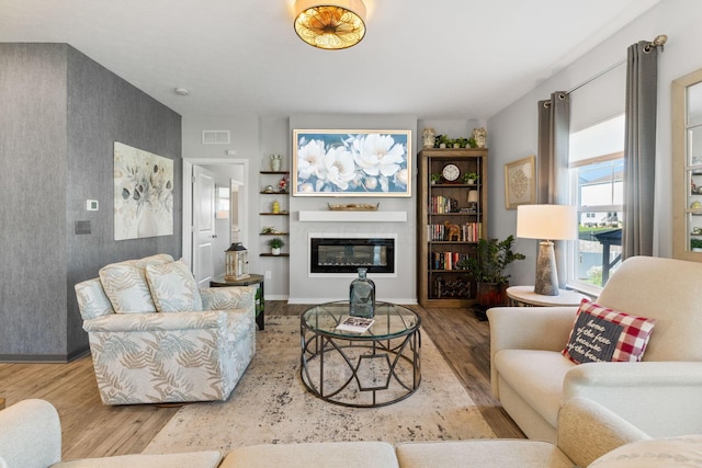 152 Natalie Ln, Granville, OH 43023 - living room with wood finished floors and a glass covered fireplace