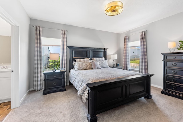 152 Natalie Ln, Granville, OH 43023 - bedroom with light carpet and ensuite bath