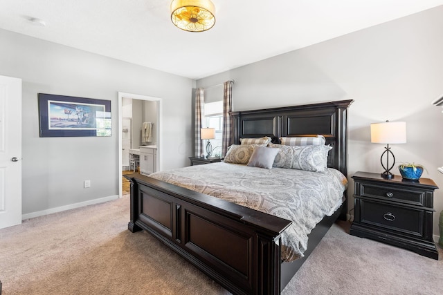 152 Natalie Ln, Granville, OH 43023 - bedroom featuring light colored carpet and ensuite bath
