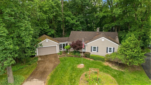 445 Hilltop Dr, Lancaster, OH 43130 - view of front facade with a front yard, a detached garage, and a chimney