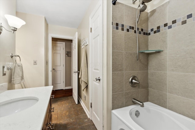 445 Hilltop Dr, Lancaster, OH 43130 - bathroom featuring vanity, shower / washtub combination, and stone finish floors