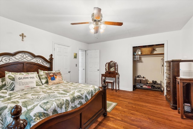 445 Hilltop Dr, Lancaster, OH 43130 - bedroom with wood finished floors, a closet, and a ceiling fan
