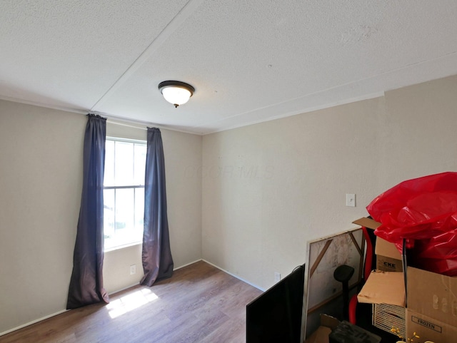 71 Biddle Blvd Unit 24, Bloomingburg, OH 43106 - office area with wood finished floors and a textured ceiling