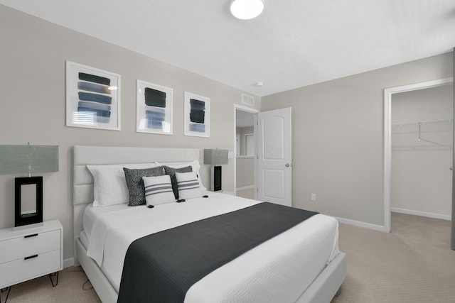 1180 Lake Forest Dr, Hebron, OH 43025 - bedroom featuring light carpet and a spacious closet