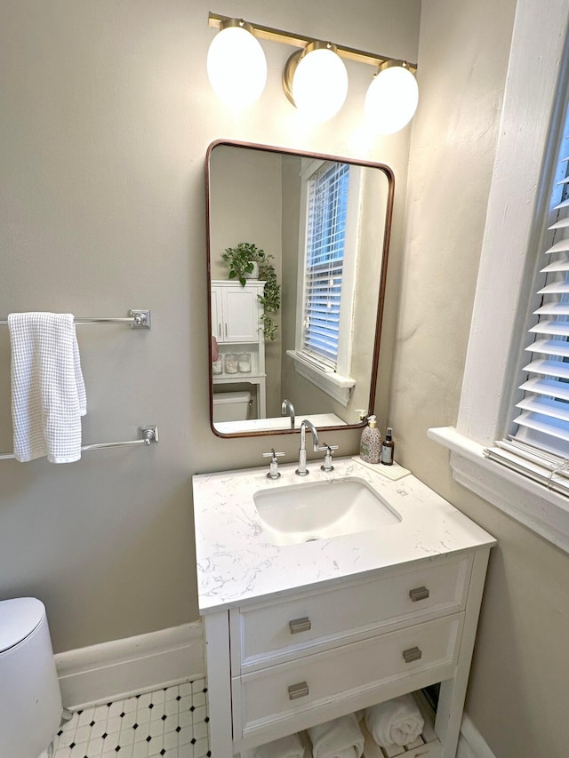 252 W Hubbard Ave, Columbus, OH 43215 - bathroom with toilet and vanity