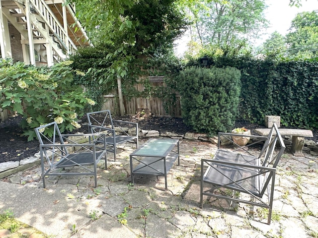 252 W Hubbard Ave, Columbus, OH 43215 - fenced backyard featuring a patio area
