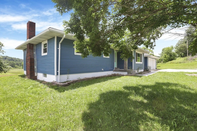39703 Maysville Greendale Rd, Logan, OH 43138 - view of front facade with a chimney and a front yard